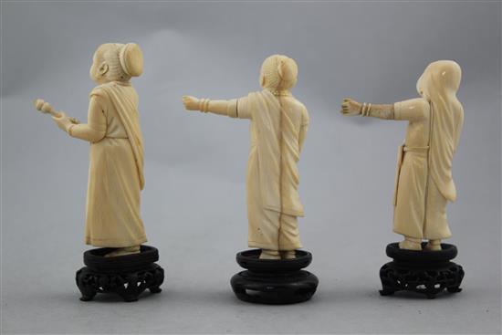 A Chinese ivory model of a dragon boat and four Indian ivory figures of ladies, early 20th century, 10.5cm. - 28cm.
